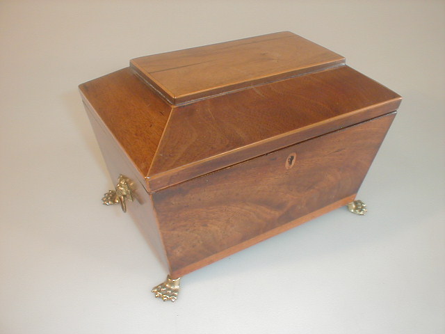 Appraisal: A Regency period figured Mahogany sarcophagus tea caddy with gilt