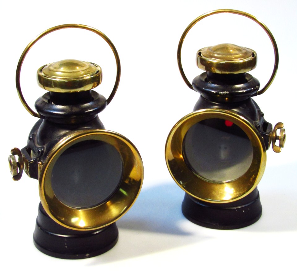 Appraisal: A near matching pair of coach lanterns one with Lucas