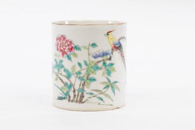 Appraisal: A Chinese tankard painted an exotic bird in flowering branches