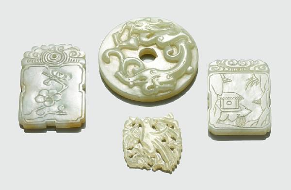 Appraisal: Three small jade carvings The first a circular disk bi