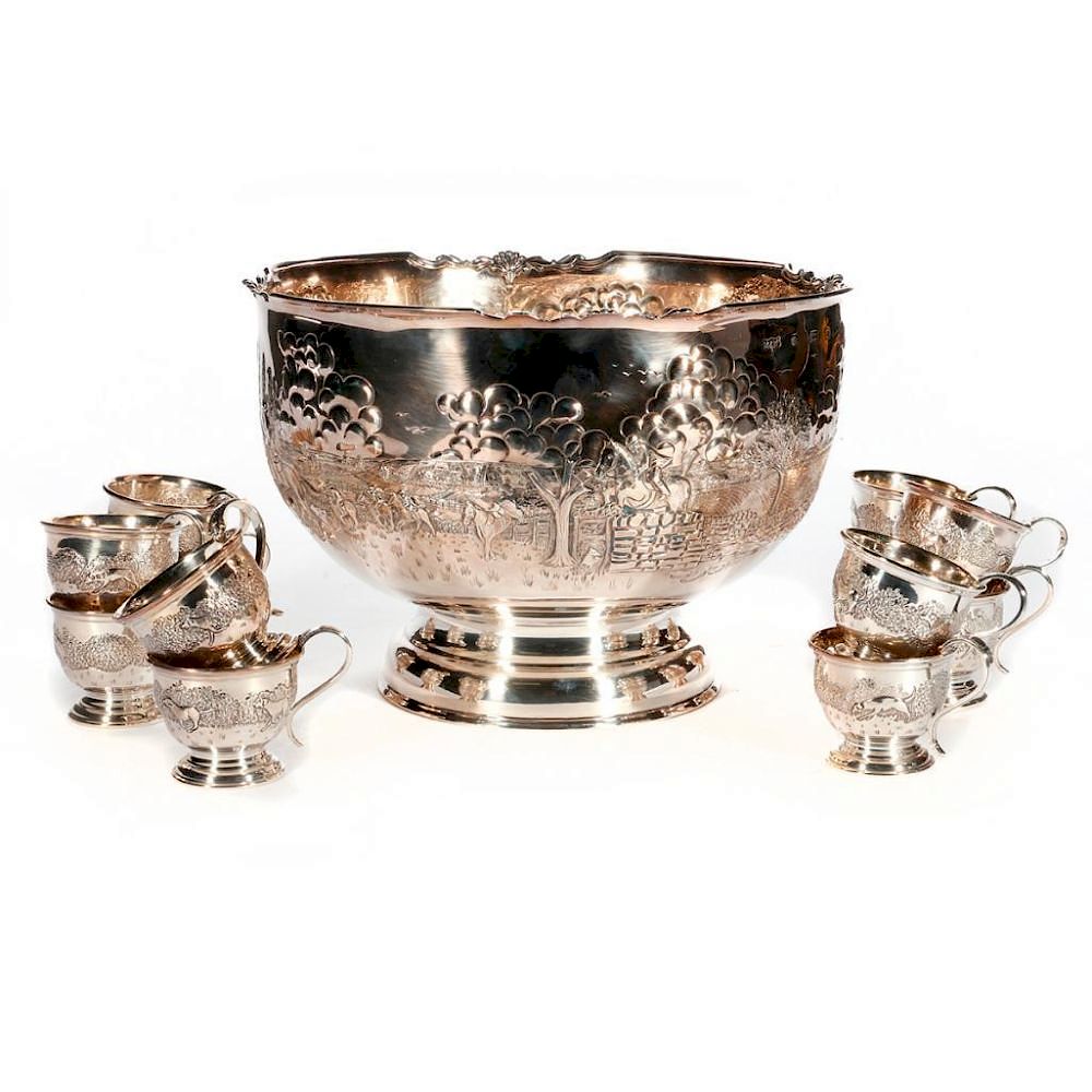 Appraisal: A sterling punch bowl and twelve sterling cups with a