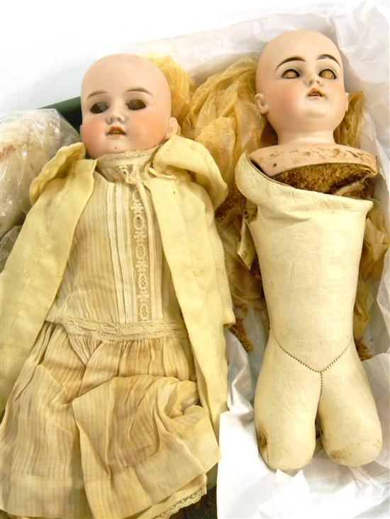 Appraisal: Two German bisque dolls '' open mouth German shoulderhead on