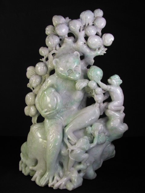 Appraisal: Very large Chinese light green jadeite detailed carved of monkeys