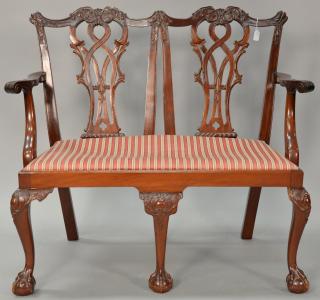 Appraisal: Custom mahogany double chair back settee with open carved backs