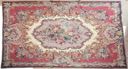 Appraisal: An Aubusson style needlepoint carpet the central grey and ivory