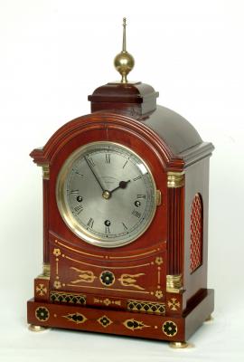 Appraisal: A MANTEL CLOCK the twin barrel movement with Westminster chimes