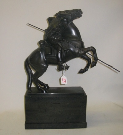 Appraisal: A DARK BROWN SPELTER-LIKE METAL FIGURE depicting a Prussian soldier