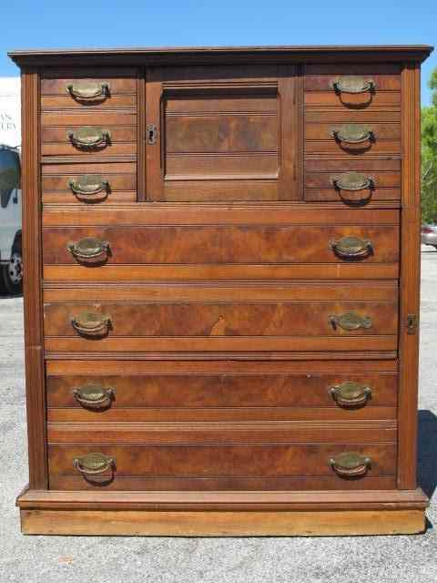 Appraisal: Antique walnut side lock highboy Side locking mechanism drawers and