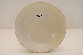 Appraisal: CHINESE WHITE GLAZED SUNG YUAN STYLE CARVED DISH