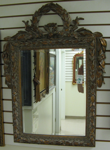 Appraisal: TWO BEVELED WALL MIRRORS the first with recessed black and