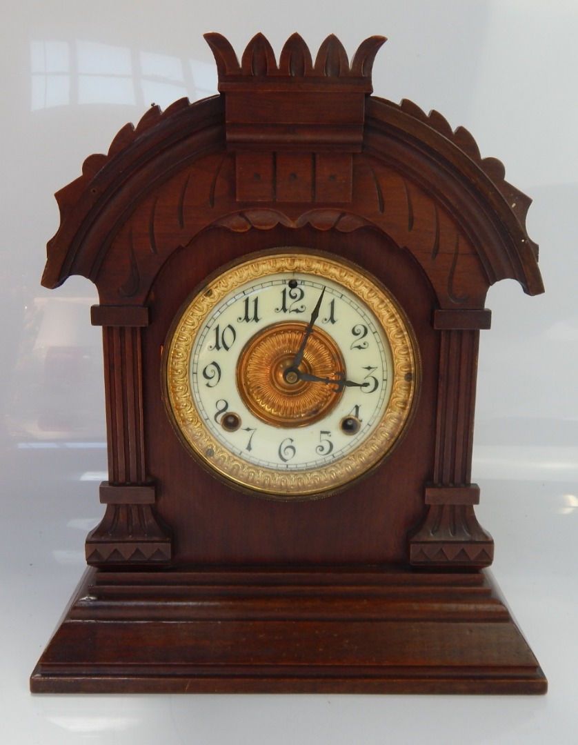 Appraisal: An Ansonia American Tunis day walnut mantel clock having split