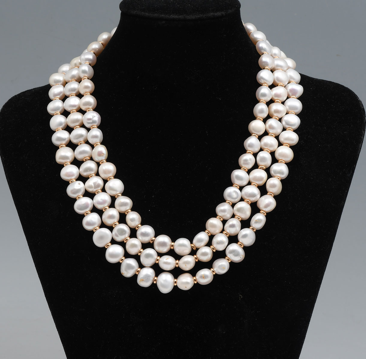 Appraisal: K FRESHWATER PEARL NECKLACE Triple strand of mm freshwater cultured