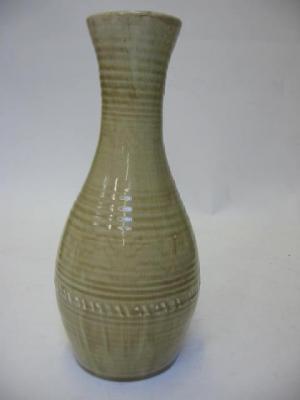 Appraisal: A WILLIAM MOORCROFT VASE of slender baluster form with ribbed