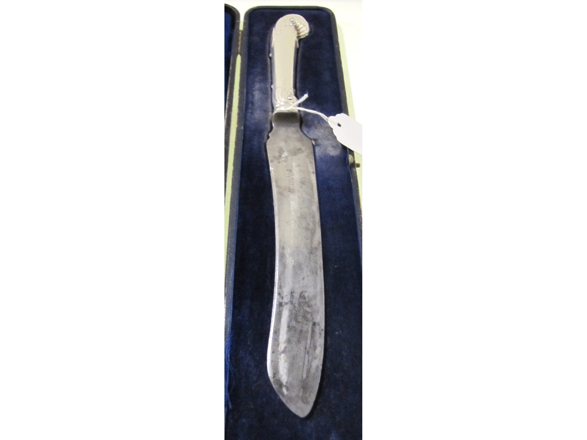 Appraisal: A silver pistol gripped handled carving knife Sheffield