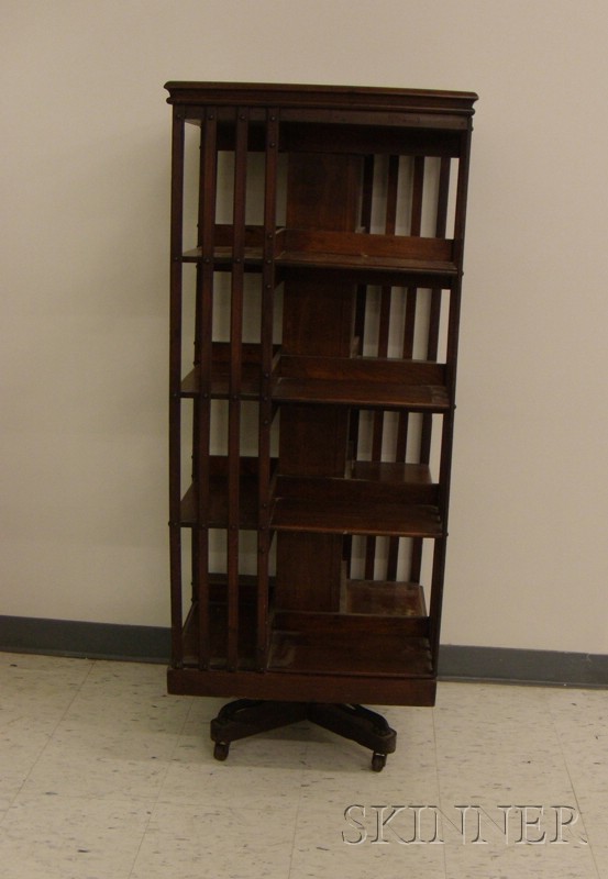 Appraisal: John Danner Walnut Revolving Bookcase Clinton Ohio on casters stenciled