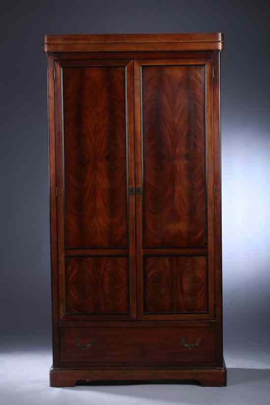 Appraisal: GEORGE III STYLE MAHOGANY ARMOIRE Molded cornice pair doors above