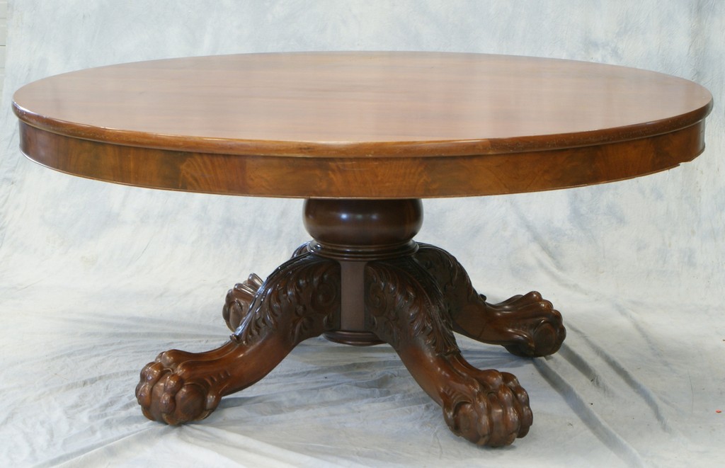 Appraisal: Round mahogany pedestal base dining room table with massive turned