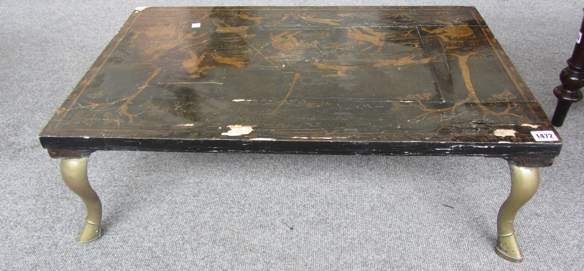 Appraisal: A black lacquer and gilt chinoiserie decorated rectangular coffee table