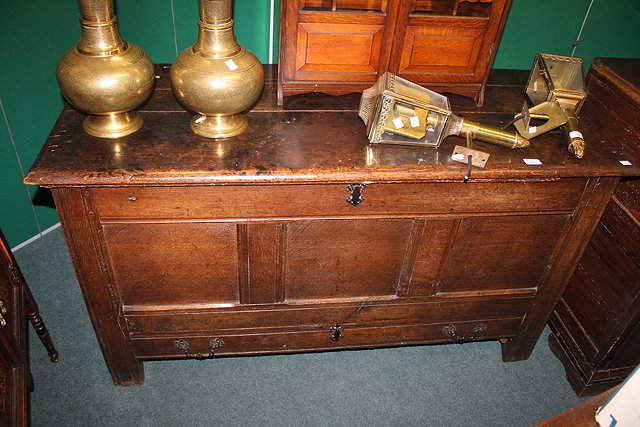 Appraisal: A GEORGIAN MULE CHEST with hinged lid and panelled front