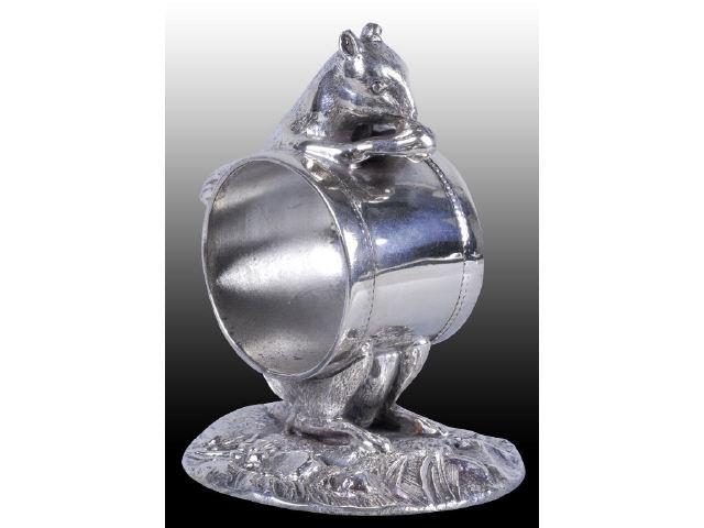 Appraisal: Squirrel with Nut Figural Napkin Ring Description Round earthen base