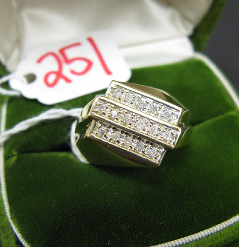 Appraisal: MAN'S DIAMOND AND TEN KARAT GOLD RING set with two