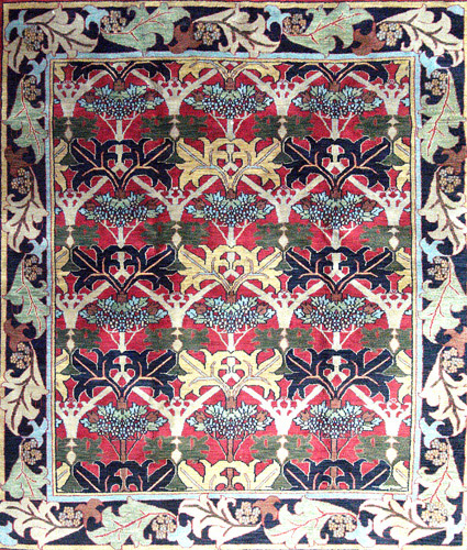 Appraisal: WILLIAM MORRIS-STYLE Rug with repeating leaves and blossoms in dusty