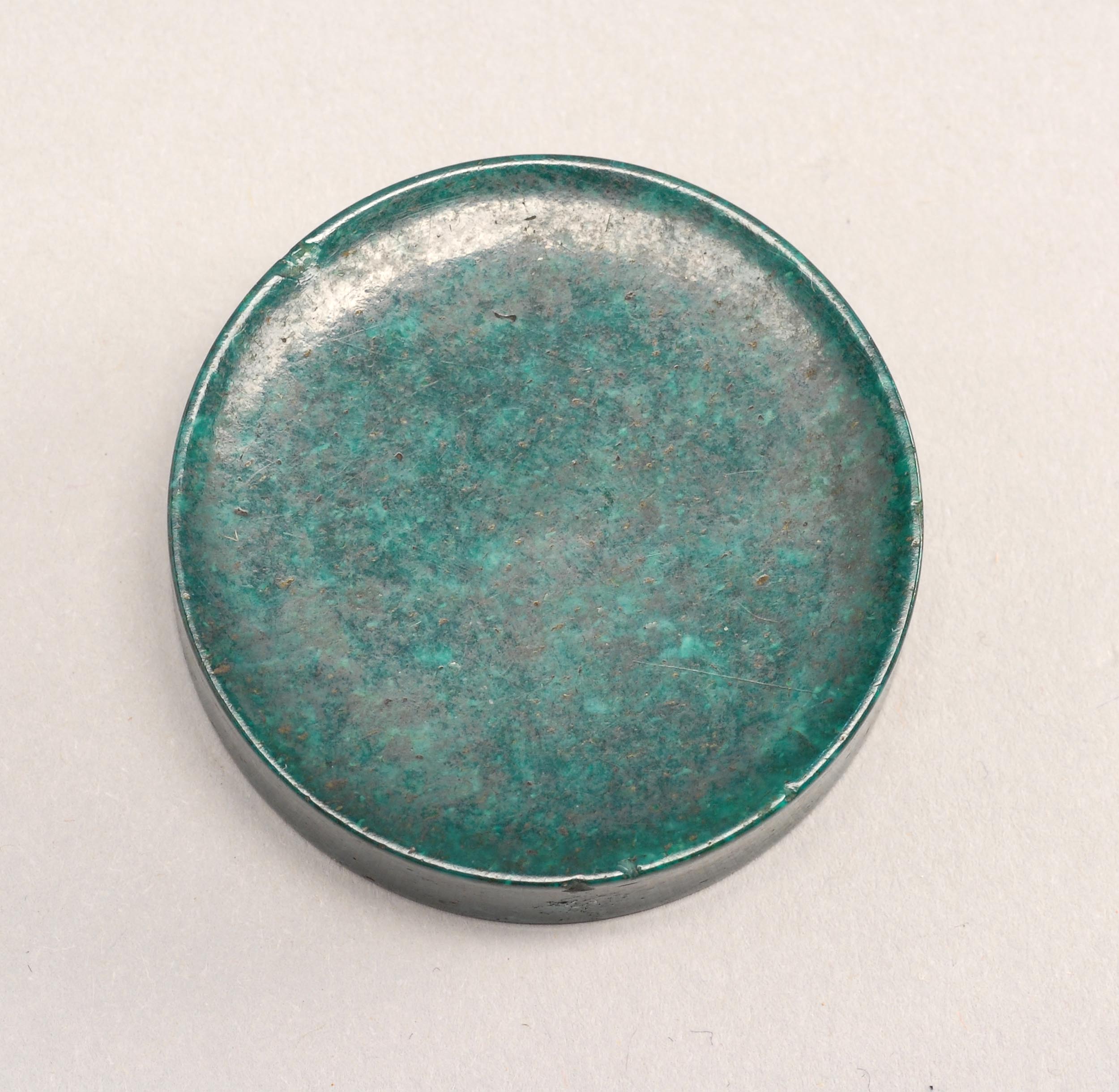 Appraisal: MALACHITE SNUFF SAUCER th CenturyIn simple disk form Diameter cm