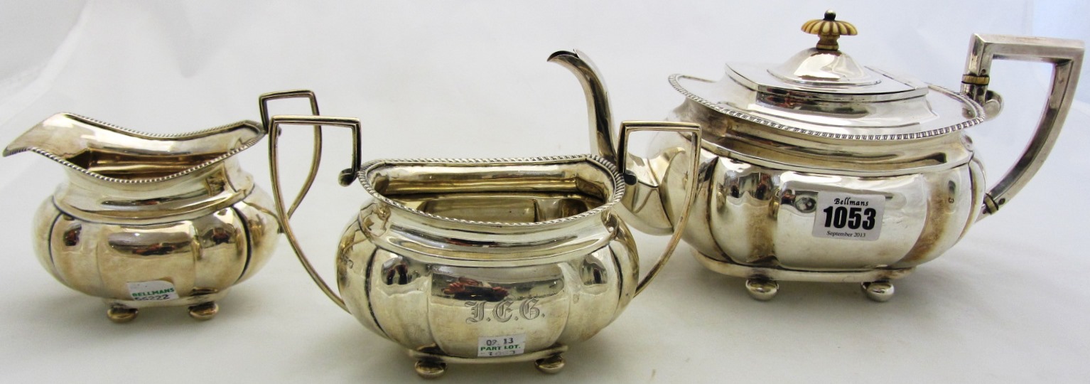 Appraisal: A silver three piece tea set comprising a teapot Chester