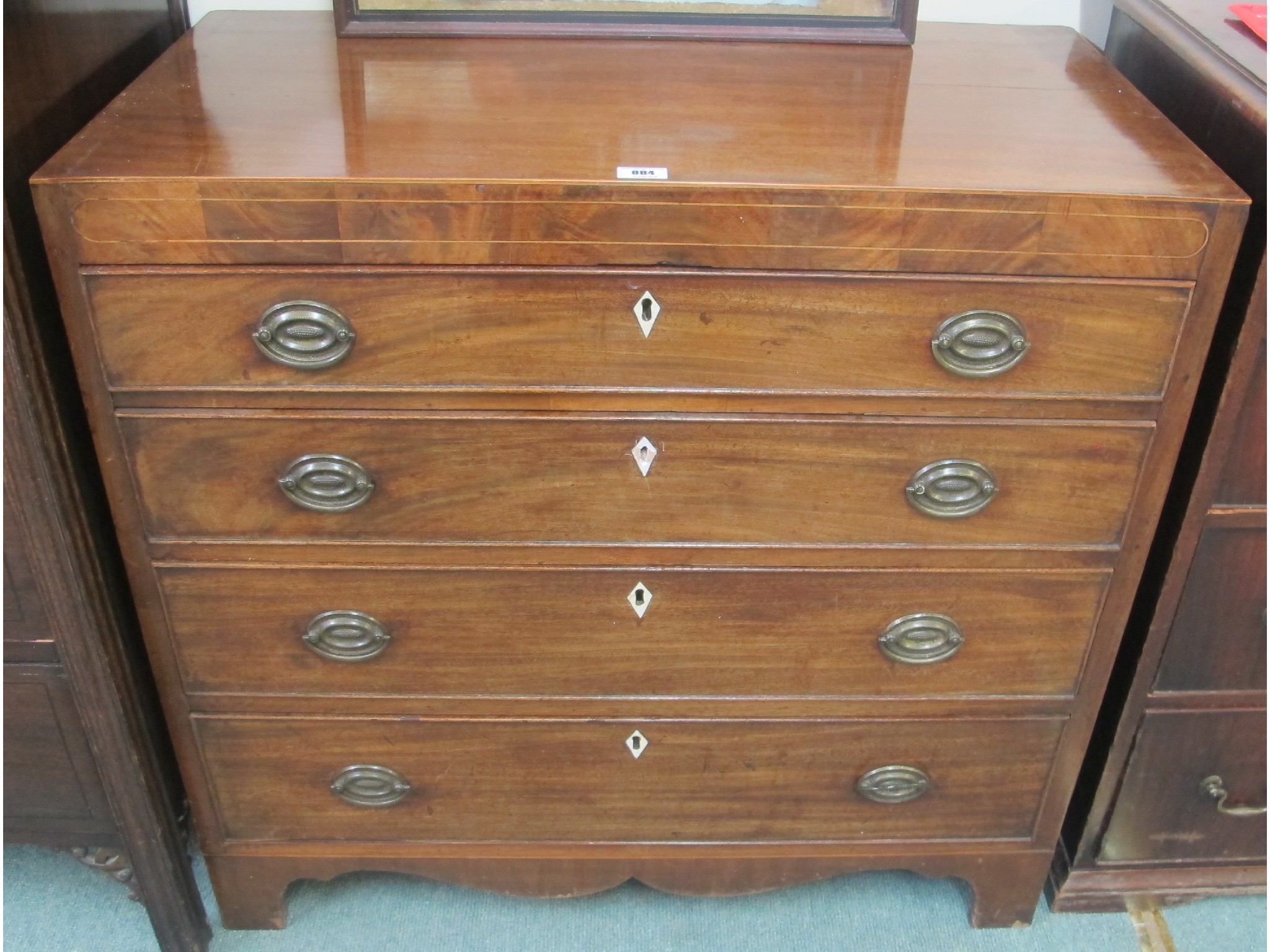 Appraisal: A Georgian mahogany four drawer chest