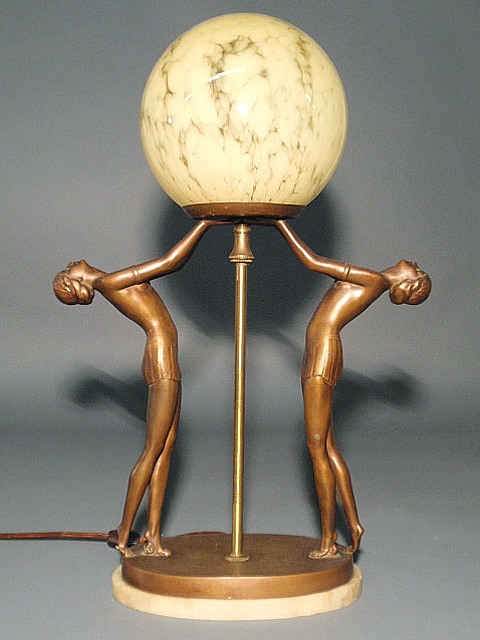 Appraisal: Art Deco faux bronze lamp with two female figures holding