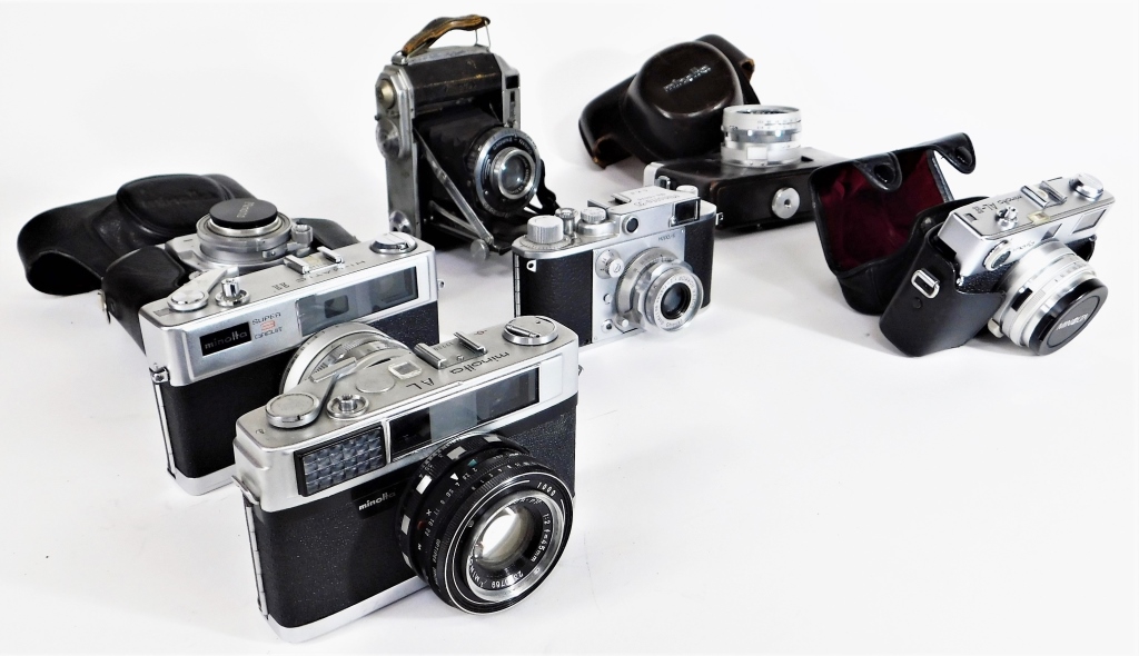 Appraisal: GROUP OF MINOLTA MM CAMERAS Group of Minolta mm cameras