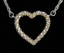 Appraisal: Tiffany Co Sterling Silver and Gold Heart Pendant with Chain