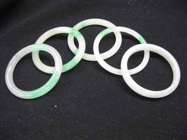 Appraisal: Jade Bangle Bracelets off white to greenarranging from mm to