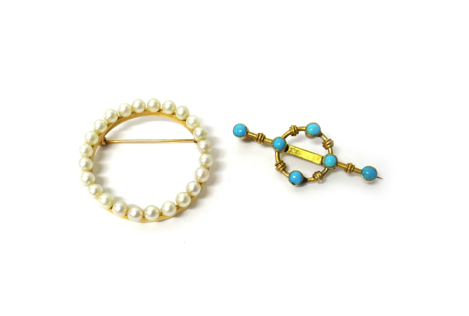 Appraisal: A gold and cultured pearl brooch in a circular openwork