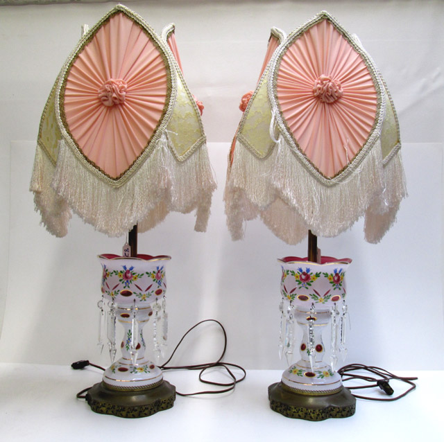 Appraisal: PAIR OF BOHEMIAN GLASS TABLE LAMPS with cased pink and