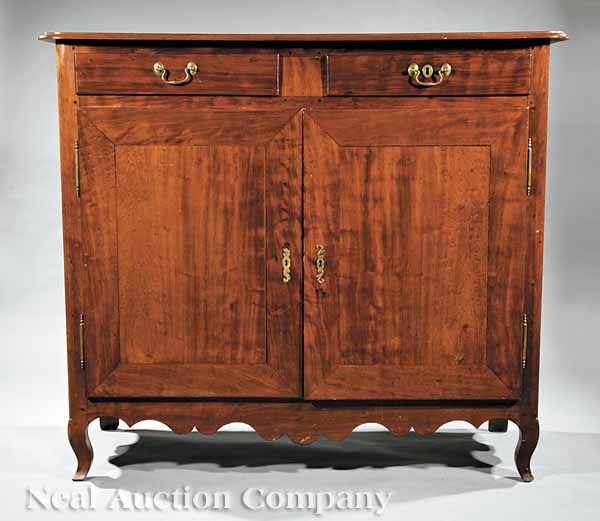 Appraisal: A West Indies Carved Mahogany Buffet th c the single