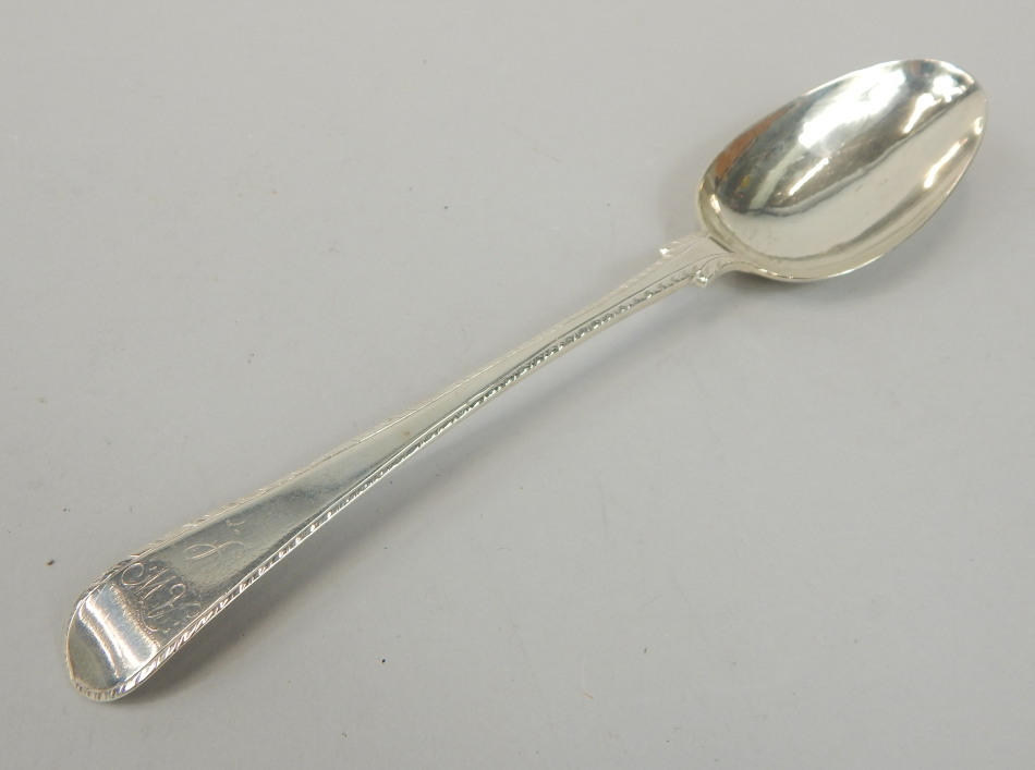 Appraisal: A George III silver Old English pattern tablespoon with feathered