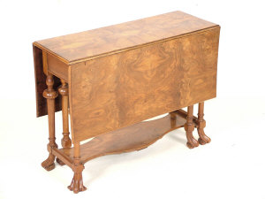 Appraisal: A walnut Sutherland table late th century the drop leaf