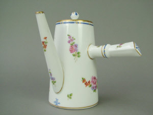 Appraisal: Chocolate pot and cover with a white ground painted in