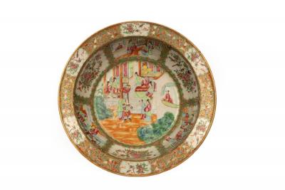 Appraisal: A Cantonese bowl decorated reserves of figures alternating with reserves