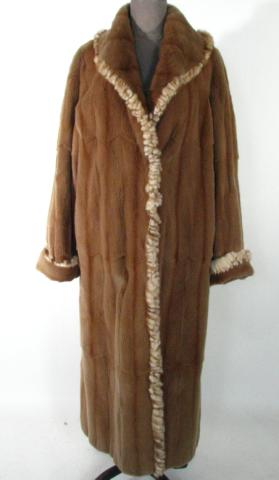 Appraisal: Cognac Sheared Mink Coat w Fringe Trim Size Length Retail