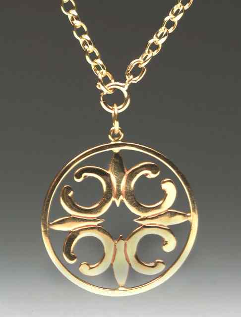 Appraisal: A CT GOLD PENDANT in the form of St Magnus