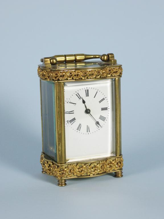 Appraisal: An Edwardian Carriage Clock with cylinder escapement in brass framed