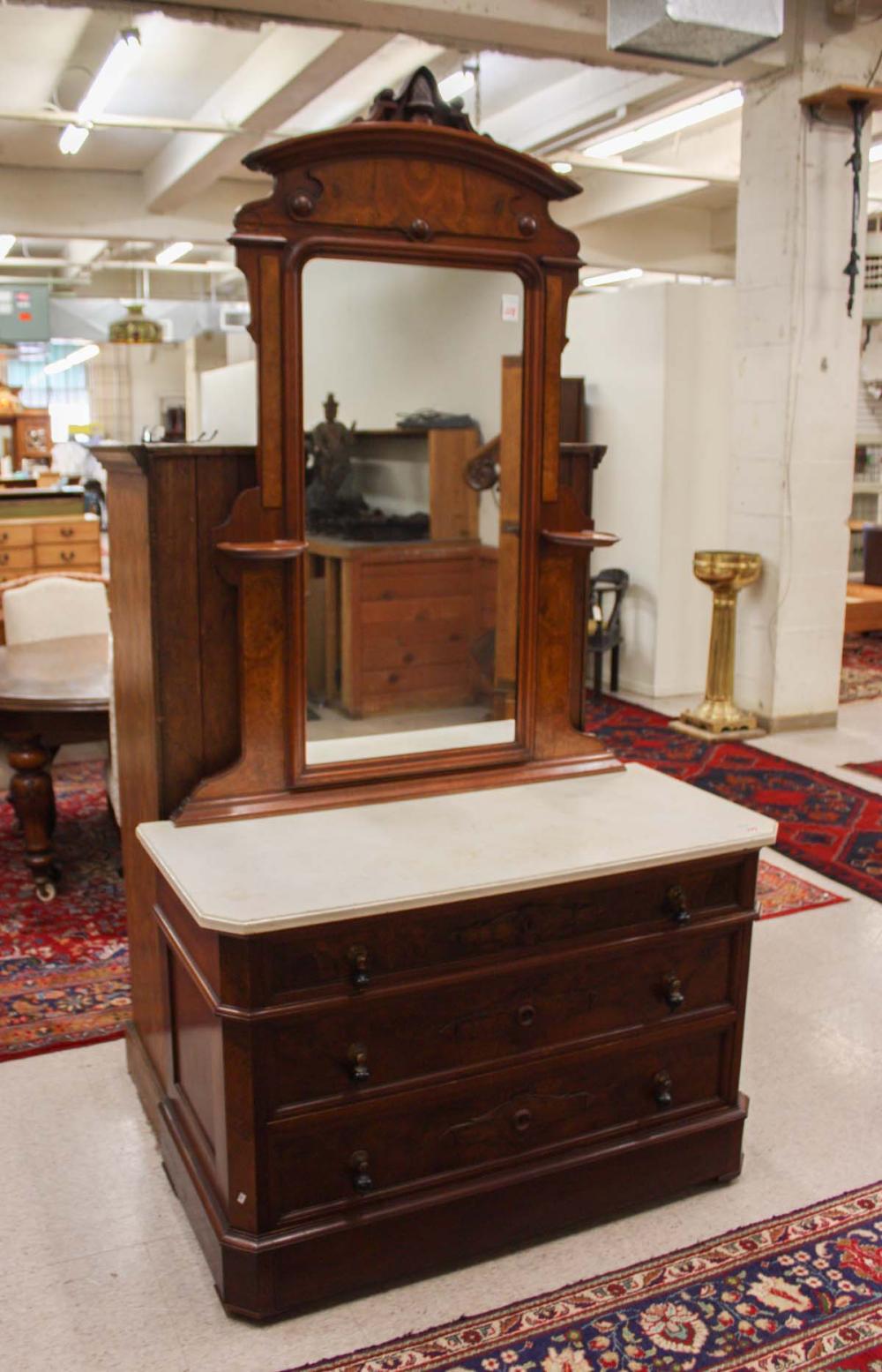 Appraisal: A VICTORIAN MARBLE-TOP WALNUT DRESSER Renaissance Revival design American c