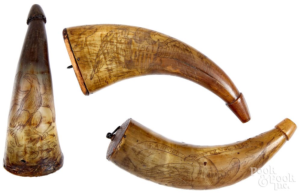 Appraisal: Three scrimshaw powder horns Three scrimshaw powder horns with later