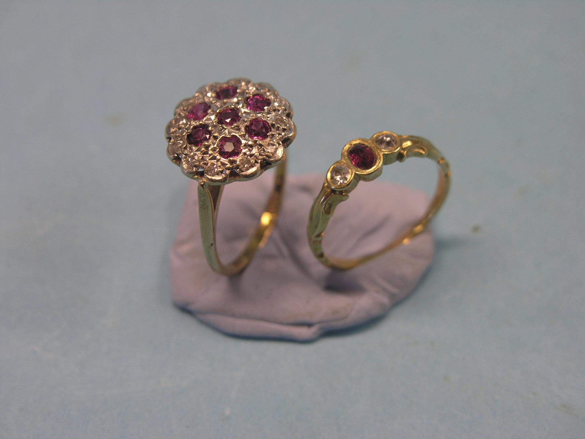 Appraisal: A gold diamond and ruby cluster ring rosette design size