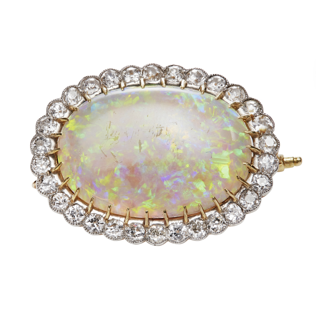 Appraisal: An opal and diamond set brooch claw set with an