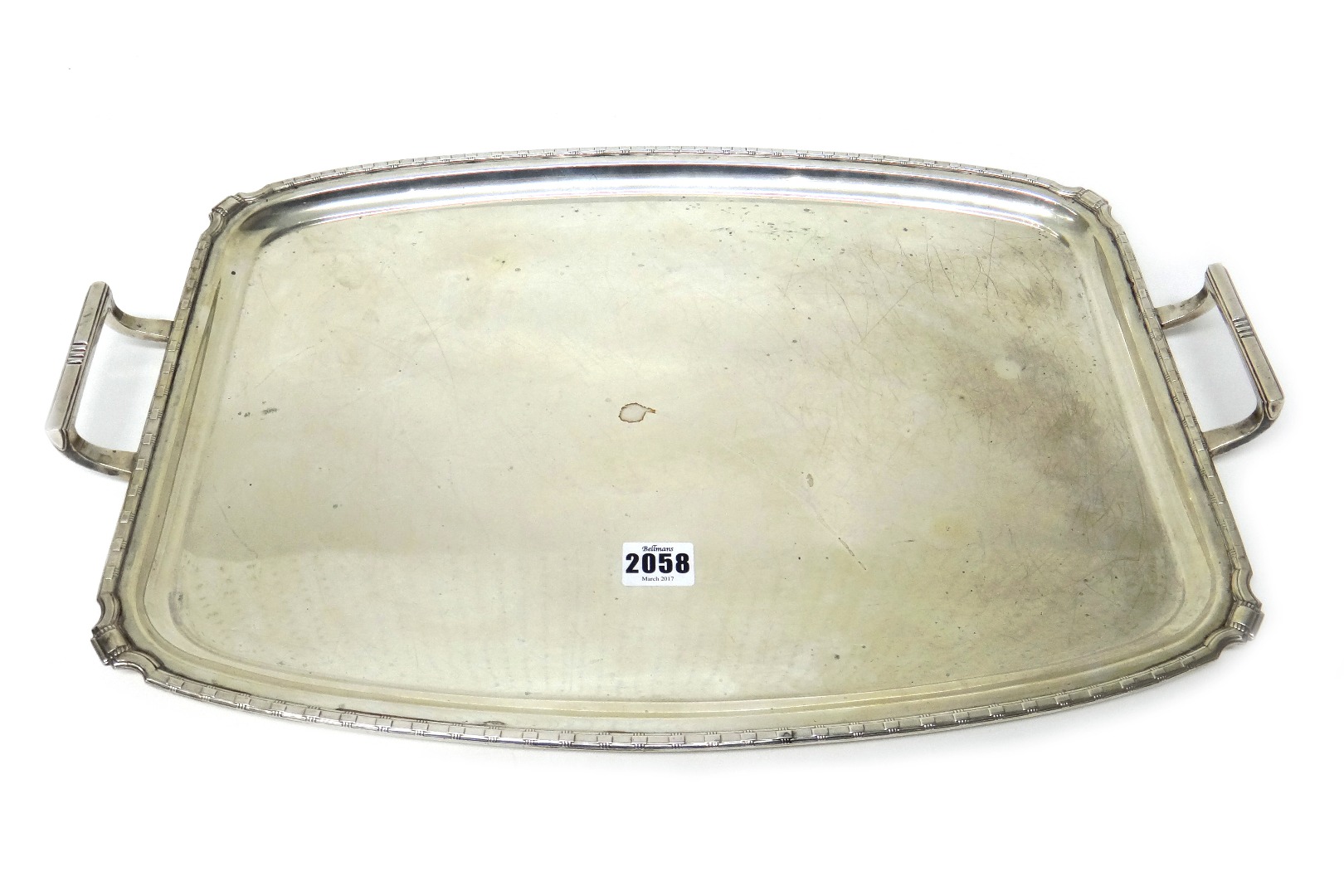 Appraisal: A silver twin handled shaped rectangular tray having a decorated