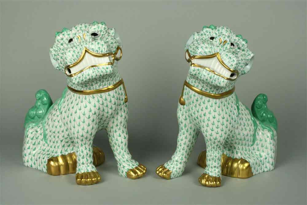 Appraisal: PAIR OF HEREND GREEN FISHNET FOO LIONS h in