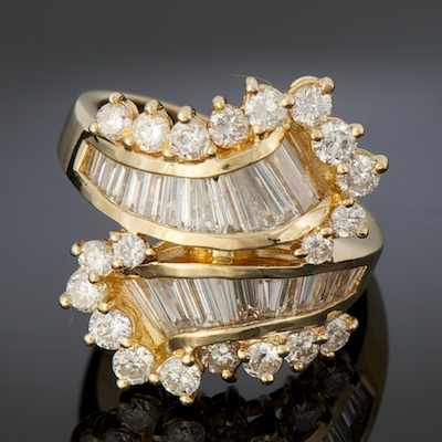 Appraisal: A Ladies' Diamond Ring k yellow gold ring of bypass